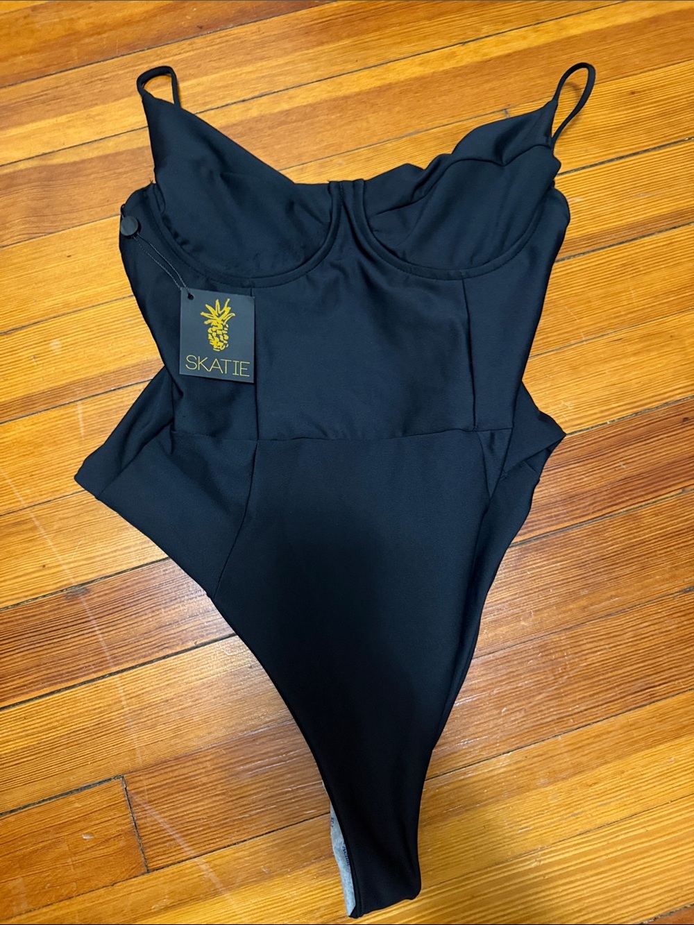 Skatie Black One-Piece Swimsuit with Shelf Cup Detail